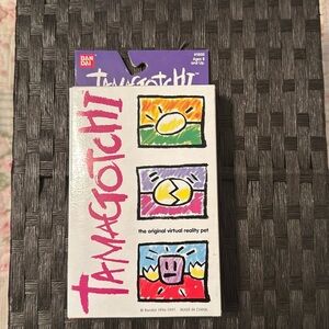 Original First Tamagotchi Translucent Blue version  Bandai 1997‎ NIB